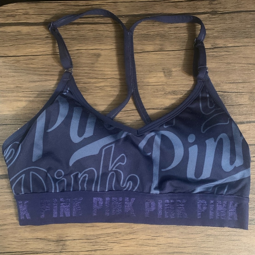 Pink sports bra (blue ) worn twice . Size small